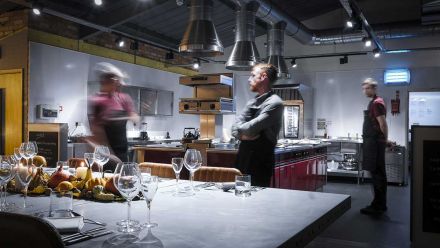 Dine at a Zinc banqueting table in a beautiful warehouse-style setting just feet away from an impressive commercial kitchen. 