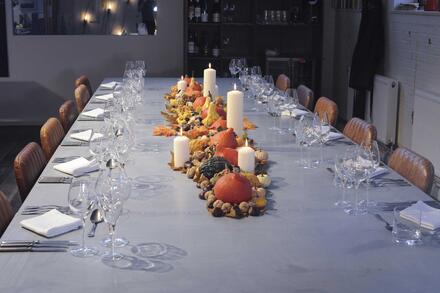Dine at a Zinc banqueting table in a beautiful warehouse-style setting just feet away from an impressive commercial kitchen. 