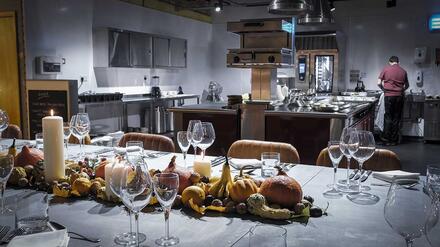 Dine at a Zinc banqueting table in a beautiful warehouse-style setting just feet away from an impressive commercial kitchen. 